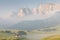 Panoramic image of Italian Dolomites with famous peaks and chalets, South Tyrol, Italy, Europe at summer sunset. Awesome