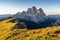 Panoramic image of Italian Dolomites with famous peaks and chalets, South Tyrol, Italy, Europe at summer sunset. Awesome