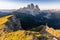 Panoramic image of Italian Dolomites with famous peaks and chalets, South Tyrol, Italy, Europe at summer sunset. Awesome