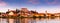 Panoramic Image of Ptuj Cityscape in Slovenia. Townscape Reflection in River at Sunset