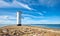 Panoramic image of seawall and old whitewashed windmill lighthouse in Swinoujscie, a port in Poland on the Baltic Sea