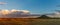 Panoramic image of the Sonoran Desert of Arizona during sunset with distant rain