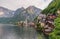 Panoramic lake with mountain and Hallstatt village in summer, famous landmark and travel destination in Austria