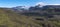 Panoramic landscape with blue Markarfljot river canyon, green hills and eyjafjallajokull volcano glacier. Laugavegur