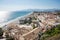 Panoramic landscape of the city and the beach od Sperlonga at   sunset. Aerial view. Italian coastline.