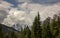 Panoramic landscape of the Dolomites on the Italian side, on the left the three peaks of Lovereto.