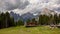 Panoramic landscape of the Dolomites on the Italian side, on the left the three peaks of Lovereto.