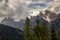 Panoramic landscape of the Dolomites on the Italian side, on the left the three peaks of Lovereto.