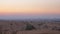 Panoramic landscape evening sky over boundless sand dunes in wild desert