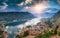 Panoramic landscape Kotor bay in Montenegro at sunset. Dramatic evening light. Balkans, Adriatic sea, Europe.