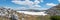 Panoramic landscape. The last snow on the Krippenstein mountain in the Dachstein Mountains. Salzkammergut. Austria