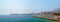 Panoramic landscape of Mediterranean sea and Benidorm city skyline