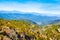 Panoramic landscape with mountain and green hills