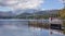 Panoramic landscape of Ullswater lake with Steamer ferry jetty from Pooley Bridge, Cumbria