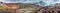 Panoramic landscape view of colorful rainbow volcanic Landmannalaugar mountains and two hikers at hiking trail path with dramatic