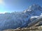 Panoramic landscape view of the majestic snowcapped great Himalayas mountain range on a winter day. They are famous for tourism in