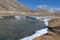 Panoramic landscape view of partially frozen Lachung river at Zero Point or Yumesamdong in winter. It is a famous tourist place in