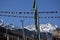 Panoramic landscape view of tibetan prayer flags raised in Lachen with snowcapped great Himalayas in the background in North