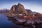 Panoramic landscape, winter mountains and fjord reflection in water. Norway, the Lofoten Islands.