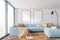 Panoramic living room, blue sofa and two posters