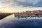 Panoramic marina with many small sailing boats docked on the shore of the city of Gijon, Asturias, Spain.