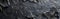 Panoramic Monochrome Concrete Texture: Banner of Black, Grey, and Anthracite Stone Background