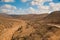 Panoramic Moroccan landscape with hills and cactuses