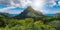 Panoramic mountain peak landscape with Cook`s Bay and Opunohu Bay on the tropical Island of Moorea, French Polynesia.
