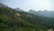 Panoramic of Mountains & hill,wind shaking pine.