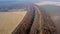 Panoramic Moving Freight Train Along Railway Tracks, Trees Agricultural Fields