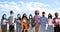 Panoramic of multiracial activists holding each others arms creating barrier wear face mask protesting on the street.