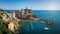 Panoramic overview of Vernazza village with colorful houses on bright summer sunny day, Cinque Terre National Park, La Spezia