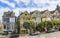 Panoramic Painted Ladies of San Francisco in the state of California, USA. Californian Victorian houses of USA with vehicles.