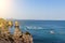 Panoramic perspective into the ocean from the rocky cliffs of Ponta da Piedade in Lagos, Portugal. Sunny day