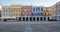 Panoramic photo of colorful renaissance buildings in the historic Great Market Square in Zamosc in southeast Poland.