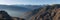 Panoramic photo of the mountain ranges of the Caucasus. A fabulous morning in the mountains. Beautiful nature.