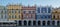 Panoramic photo of multicoloured renaissance buildings in the historic Great Market Square in Zamosc in southeast Poland.