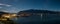 This panoramic photo was taken on top of a hill in Queenstown, New Zealand. It was night time and the town lights up beautifully.