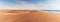 Panoramic Photograph of dunes and ocean on Namibe desert. Africa. Angola