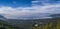 Panoramic photograph of Lake Tahoe Basin showing both Nevada and California on a smokey hazy day.