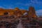 Panoramic picture of impressive sandstone formations in Arches National Park at night in winter