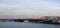 Panoramic picture of a pier and the Wharf in the city of Darwin, Northern Territory, Australia. Boats and beach near the city.