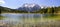 Panoramic scene in Bavaria, Germany, with mountains mirroring in lake