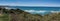 Panoramic scenic atlantic ocean coastline in sunny blue sky in bidart, basque country, france