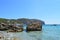 Panoramic seascape : beach, boats, mountains, cliffs, sea and sky. Mallorca, Spain