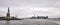 Panoramic shot of the amazing Statue of Liberty on New York city background