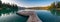 Panoramic shot of Annette lake with a wooden dock.