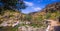 Panoramic shot of a beautiful landscape at Praia Fluvial do Penedo Furado in Portugal