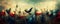 Panoramic shot of the birds flying over colorful twigs with dreamy dramatic sky