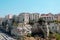 Panoramic shot of building on a cliff in Tropea, Calabria, Italy against a blue background